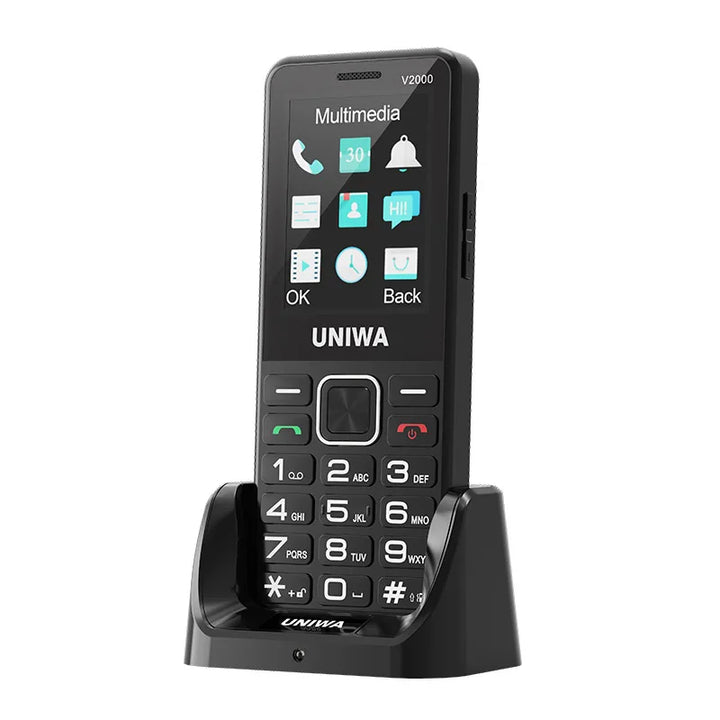 Téléphone UNIWA V2000 4G noir sur son socle de charge